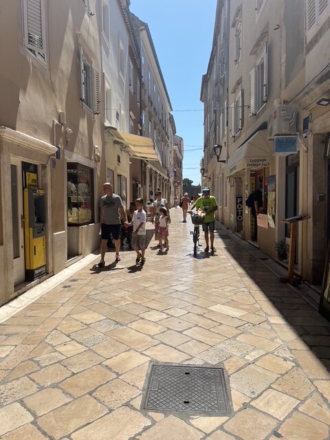 Sunlit stone street in Zadar Old Town